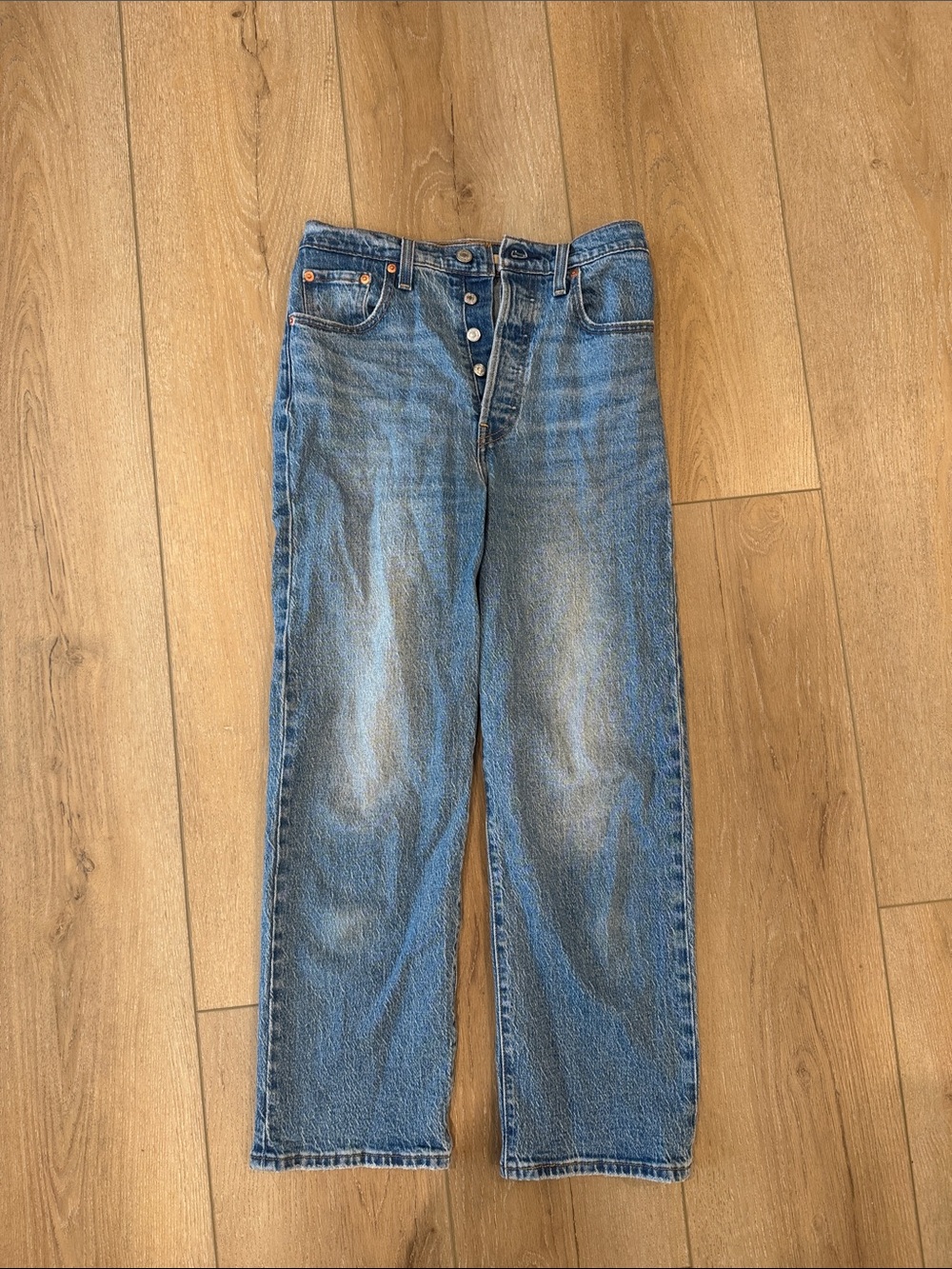 Levi's High-Rise Button-Fly Jeans in Faded Blue